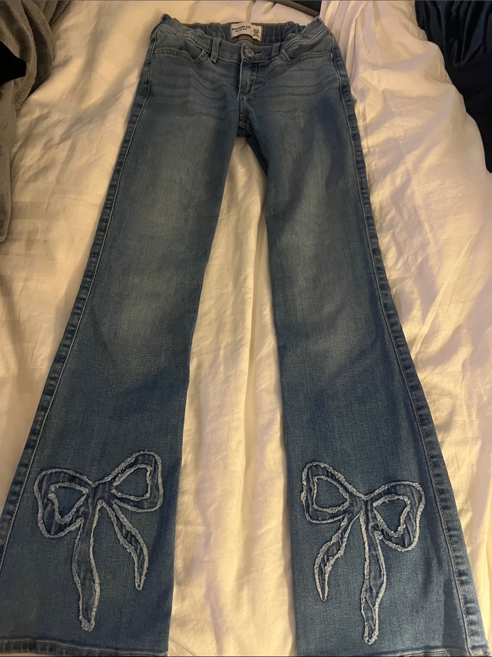 abercrombie kids Light Blue Flare Jeans with Embroidered Bow Detail